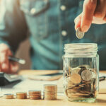 Man saving coins